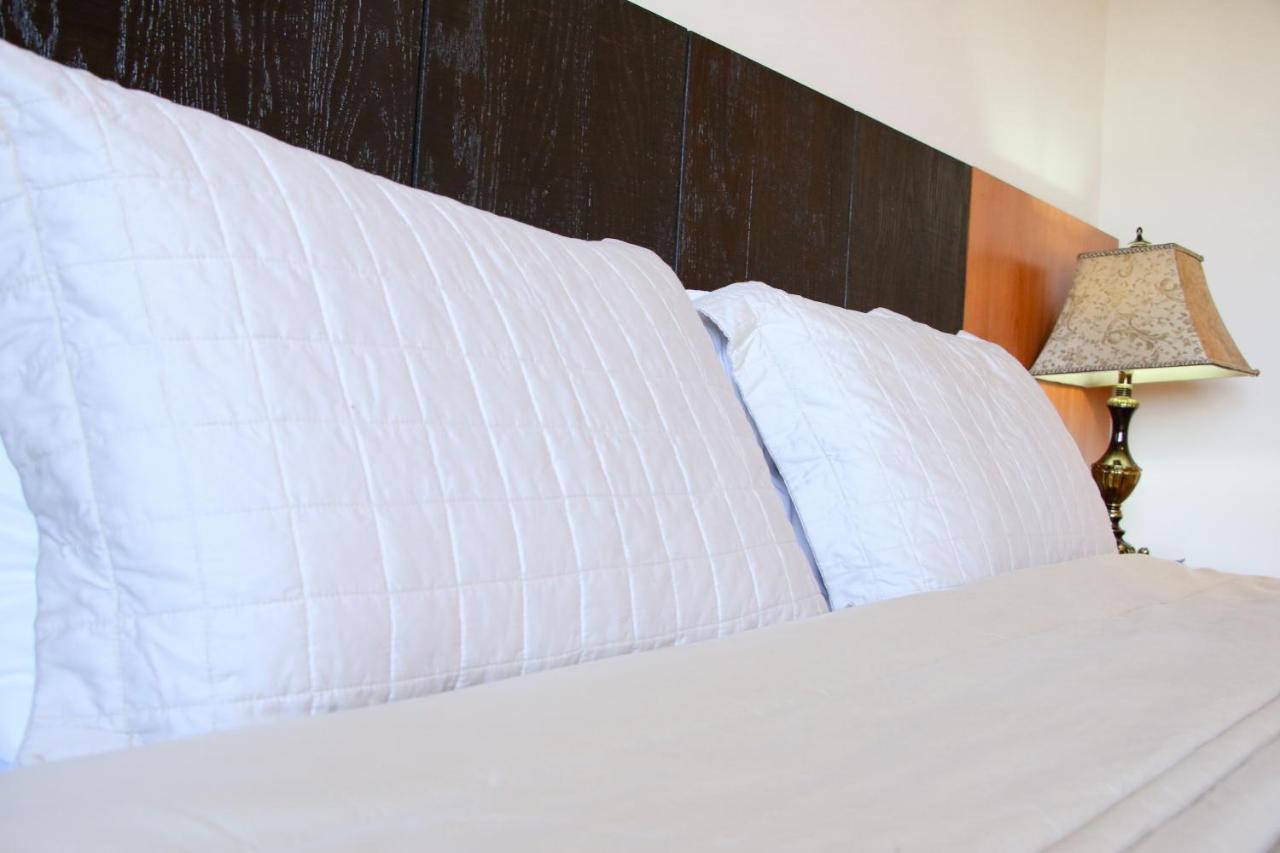 Olimpo Hotel & Suites Itaugua Екстер'єр фото