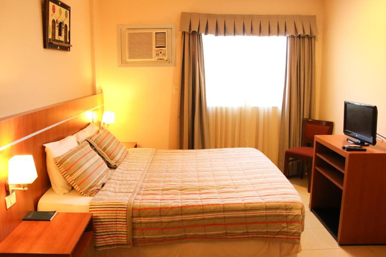 Olimpo Hotel & Suites Itaugua Екстер'єр фото