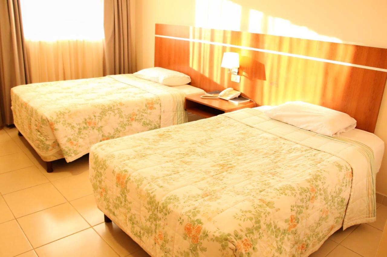 Olimpo Hotel & Suites Itaugua Екстер'єр фото