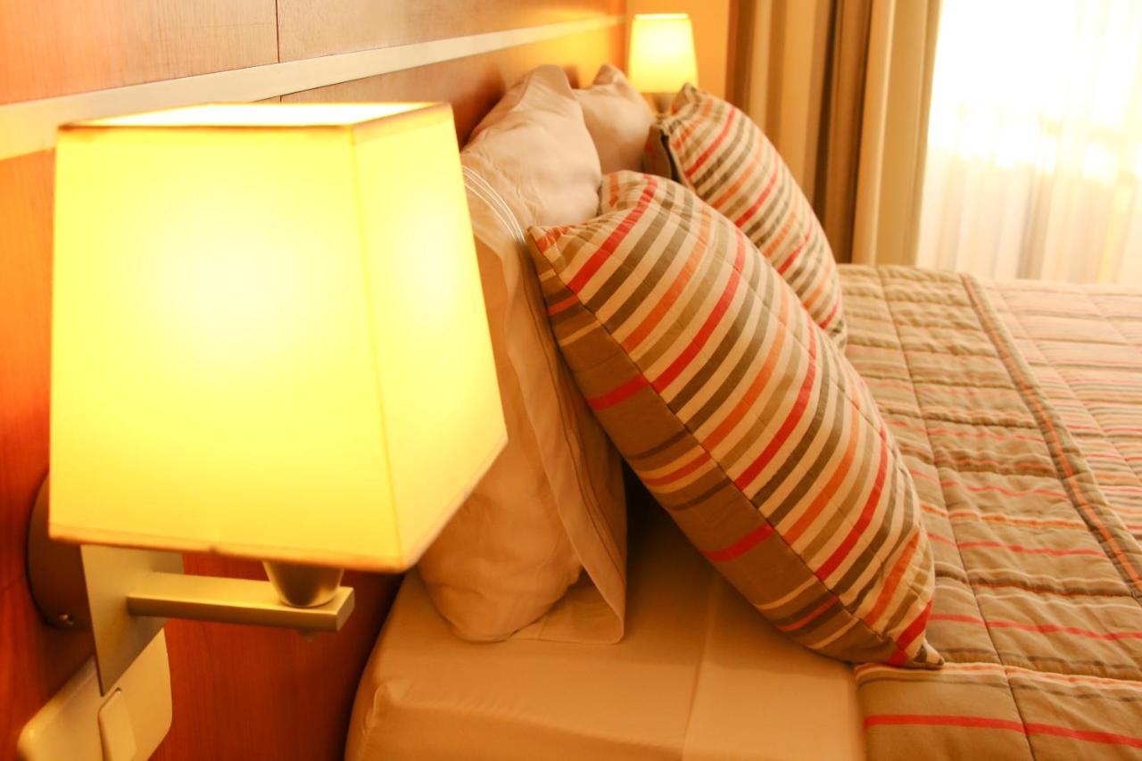 Olimpo Hotel & Suites Itaugua Екстер'єр фото